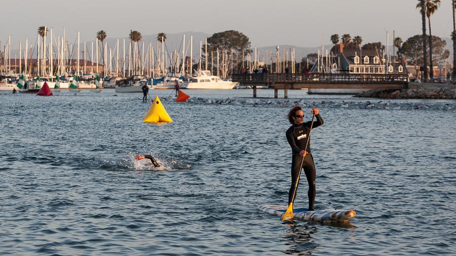 A swimmer approaches the finish of the Ironman 70.3 Oceanside swim course.