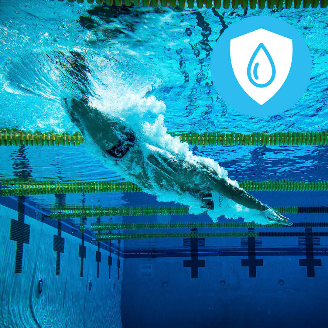 image of a swimmer diving into a pool with swimming headphones located on the h2o audio waterproof headphones homepage